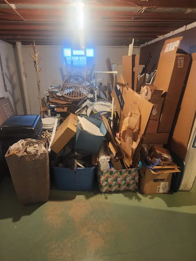 Roll-off dumpster container at job site for 2 Yard Dumpster Rental in Huntingtown